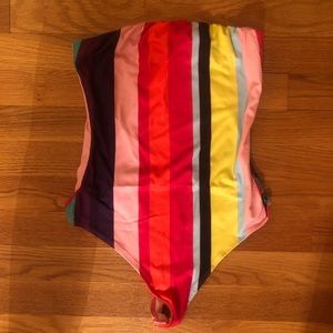 Brand new. Small. Without Tags. Bodysuit